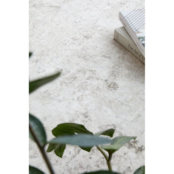 Neutral-toned Kooringal 457 marble-patterned rug with subtle gray and beige hues.