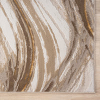 Beige and brown runner rug with abstract wavy pattern in multiple shades and gold accents.