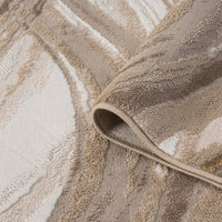 Beige and brown modern rug with abstract wavy pattern and textured surface.