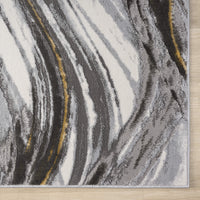 Grey runner rug with abstract wavy pattern in white, black, and gold accents, power-loomed polyester.