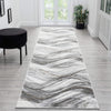 Grey and white runner rug with wavy abstract multi-colour pattern and subtle beige accents.