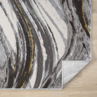 Grey runner rug with abstract wavy patterns in white, black, and mustard yellow, power-loomed polyester blend.
