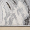 Grey and white abstract patterned modern runner rug with soft textured waves and a neatly finished edge.