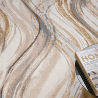 Beige modern rug with abstract wavy pattern in shades of brown, gray, and cream.
