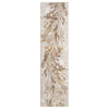 Beige runner rug with gold and taupe abstract feather pattern on a textured background.