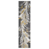 Grey runner rug with abstract feather-like patterns in white and gold tones.