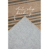 Textured rug with striped pattern and anti-slip backing