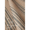 Textured rug with striped pattern and 100% recycled pile.