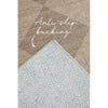 Anti-slip backing of a textured beige patterned rug