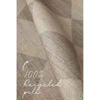 Textured machine washable rug with 100% recycled pile