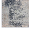Grey and beige abstract patterned modern runner rug with textured low-shed fibers.