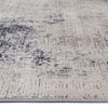 Grey and beige abstract modern runner rug with textured multi-colored pattern and low pile.