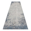 Grey and blue abstract modern runner rug with distressed texture and subtle pattern.