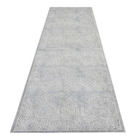 Grey runner rug with subtle textured abstract pattern and narrow border edges.