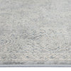 Grey runner rug with subtle abstract textured pattern in multi tones and low pile design.