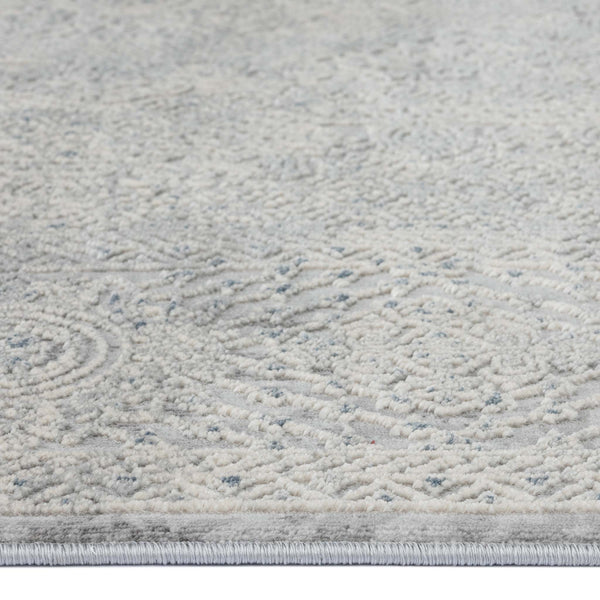Grey runner rug with subtle abstract textured pattern in multi tones and low pile design.