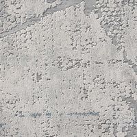 Blue grey abstract modern runner rug with textured multi-color pattern and low-shedding fibers.