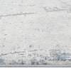 Blue grey abstract modern runner rug with textured, subtle multi-colored pattern and low pile fibers.