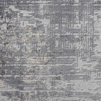 Grey and beige abstract modern runner rug with textured, multi-colored pattern.