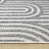 Grey flatweave runner rug with textured geometric arches and a minimalist design.