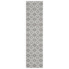 Grey flatweave runner rug with repeating diamond geometric pattern in white and charcoal tones.