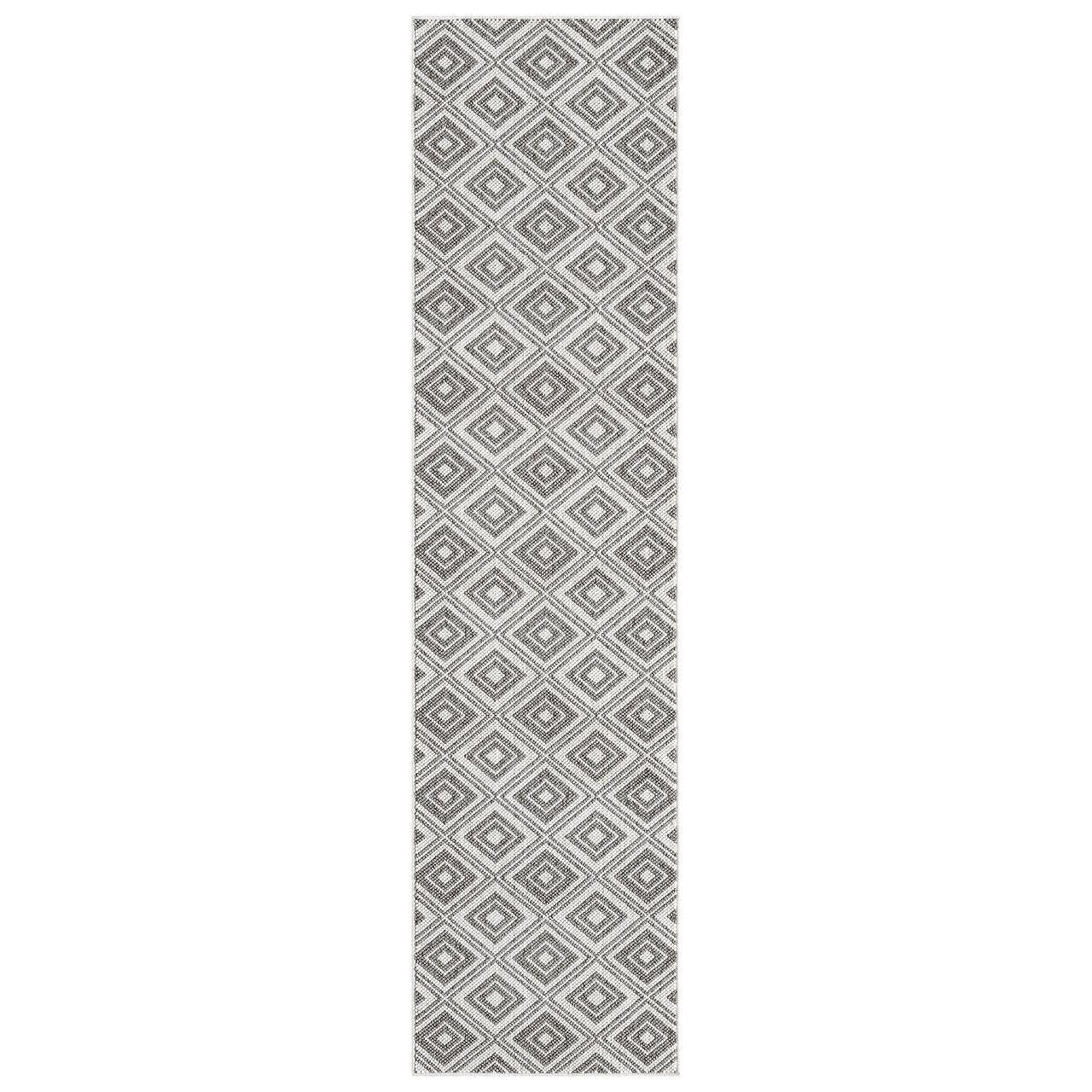 Grey flatweave runner rug with repeating diamond geometric pattern in white and charcoal tones.