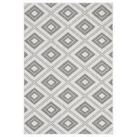Grey flatweave rug with repeating diamond geometric pattern in varying shades of grey.