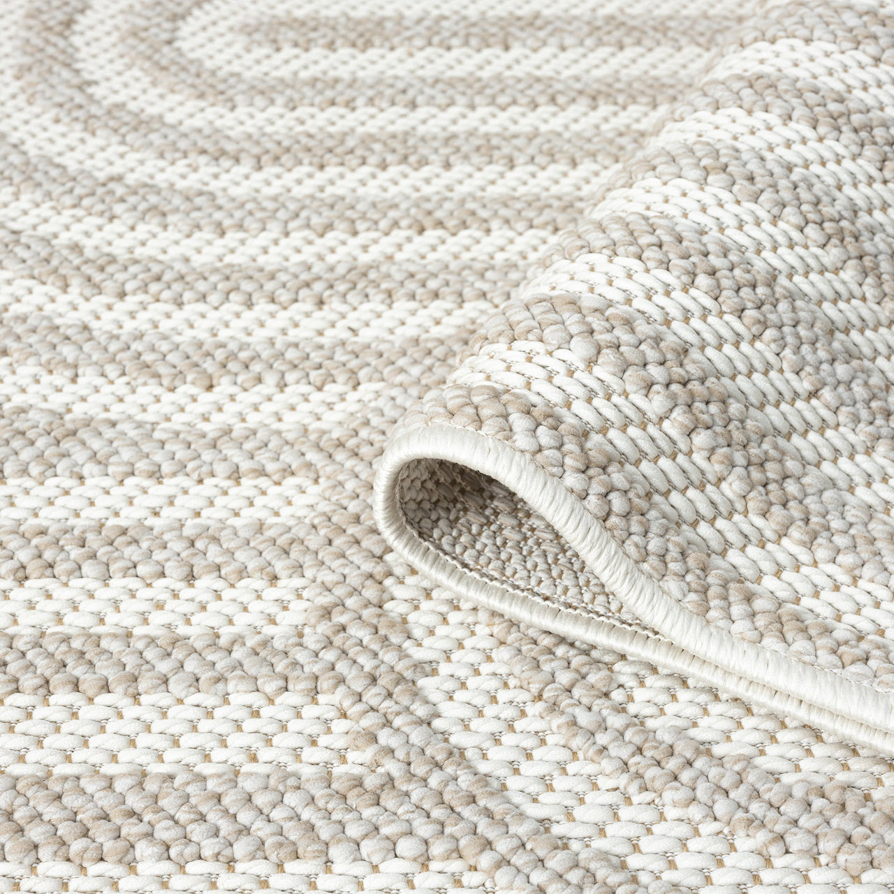 Cream flatweave runner rug with subtle raised geometric arch pattern and textured weave.