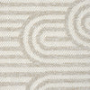 Cream flatweave rug with subtle geometric arch pattern in beige and ivory tones.