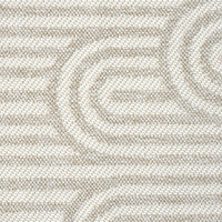 Cream flatweave rug with subtle geometric arch pattern in beige and ivory tones.
