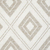 Cream flatweave rug with beige geometric diamond pattern and textured surface.