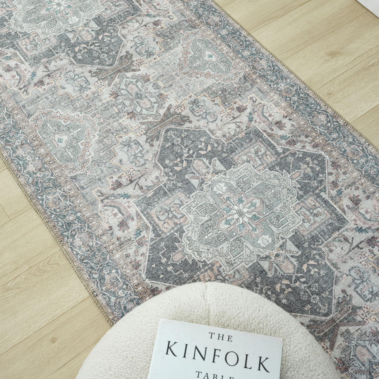 Grey multi-colored traditional runner rug with intricate floral and geometric patterns, flatwoven texture.