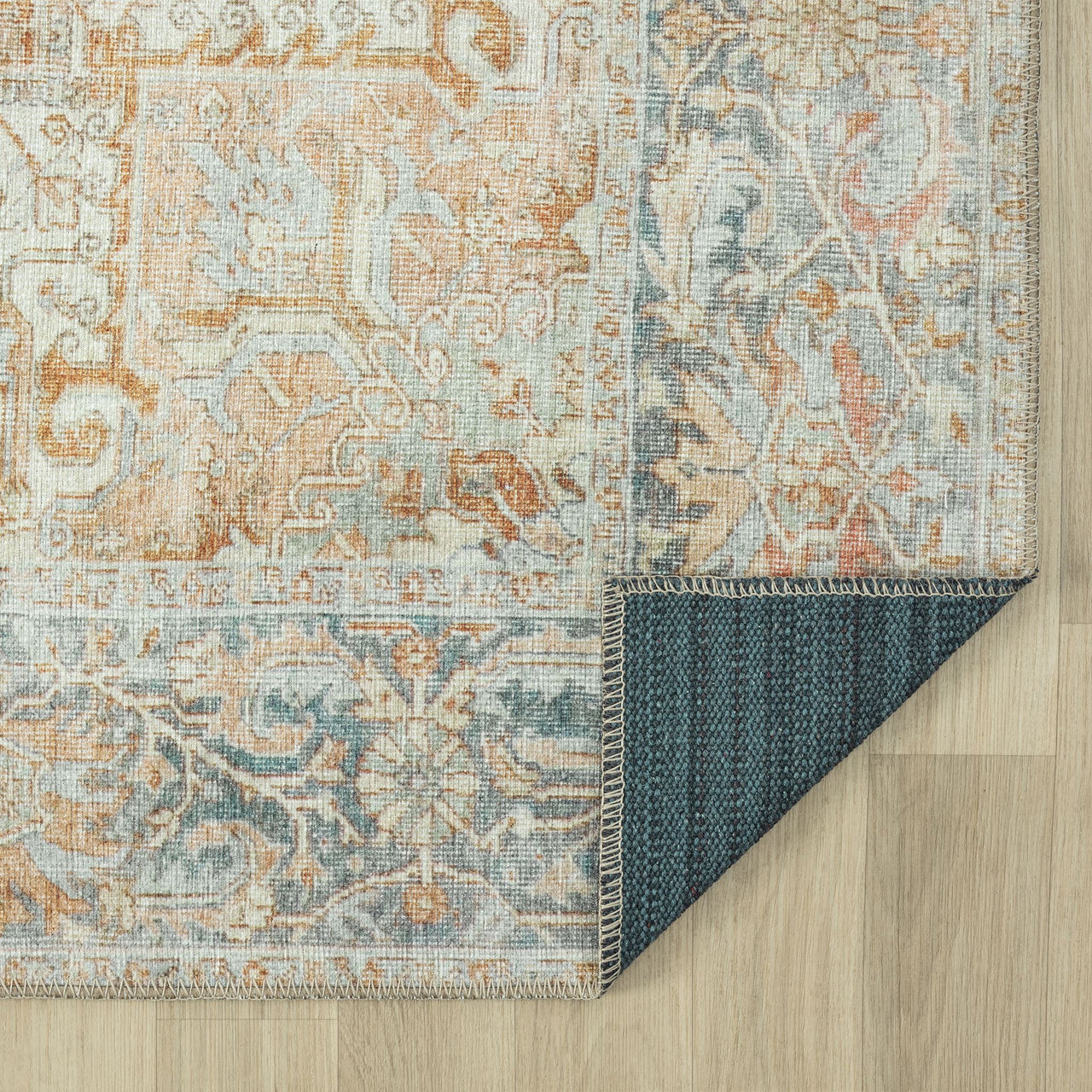 Multi-colored traditional runner rug with intricate floral and geometric patterns, distressed flatweave texture, curled.