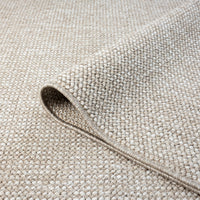 Taupe flatweave runner rug with subtle geometric texture and minimalist design in polyester.