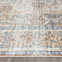 Coral multi-colored transitional rug with abstract modern pattern and soft texture.