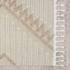 Taupe and beige runner rug with modern geometric pattern and white fringed edges.