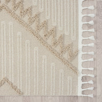 Taupe and beige runner rug with modern geometric pattern and white fringed edges.
