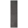 Long narrow shaggy runner rug in textured grey and silver tones.