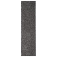 Long narrow shaggy runner rug in textured grey and silver tones.