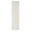 Cream-colored modern shaggy runner rug with soft, thick polyester pile.