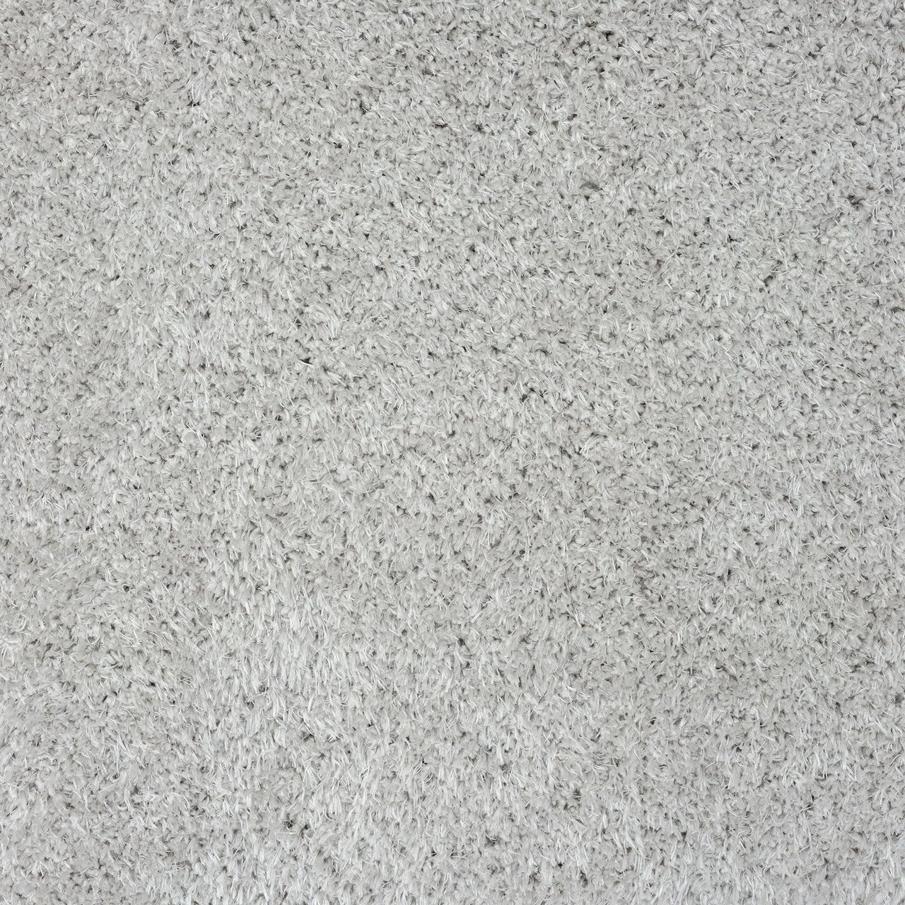 Grey modern shaggy runner rug with dense, soft polyester fibers and a plush texture.