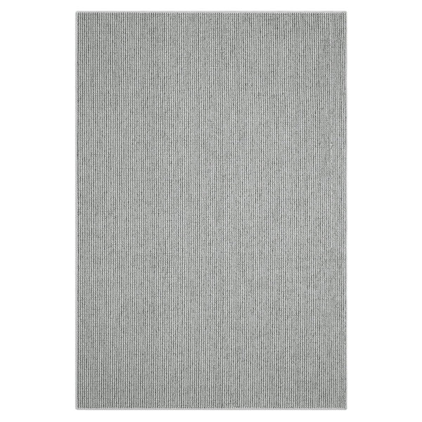 Grey flatweave rug with subtle textured geometric pattern and minimalist modern design.