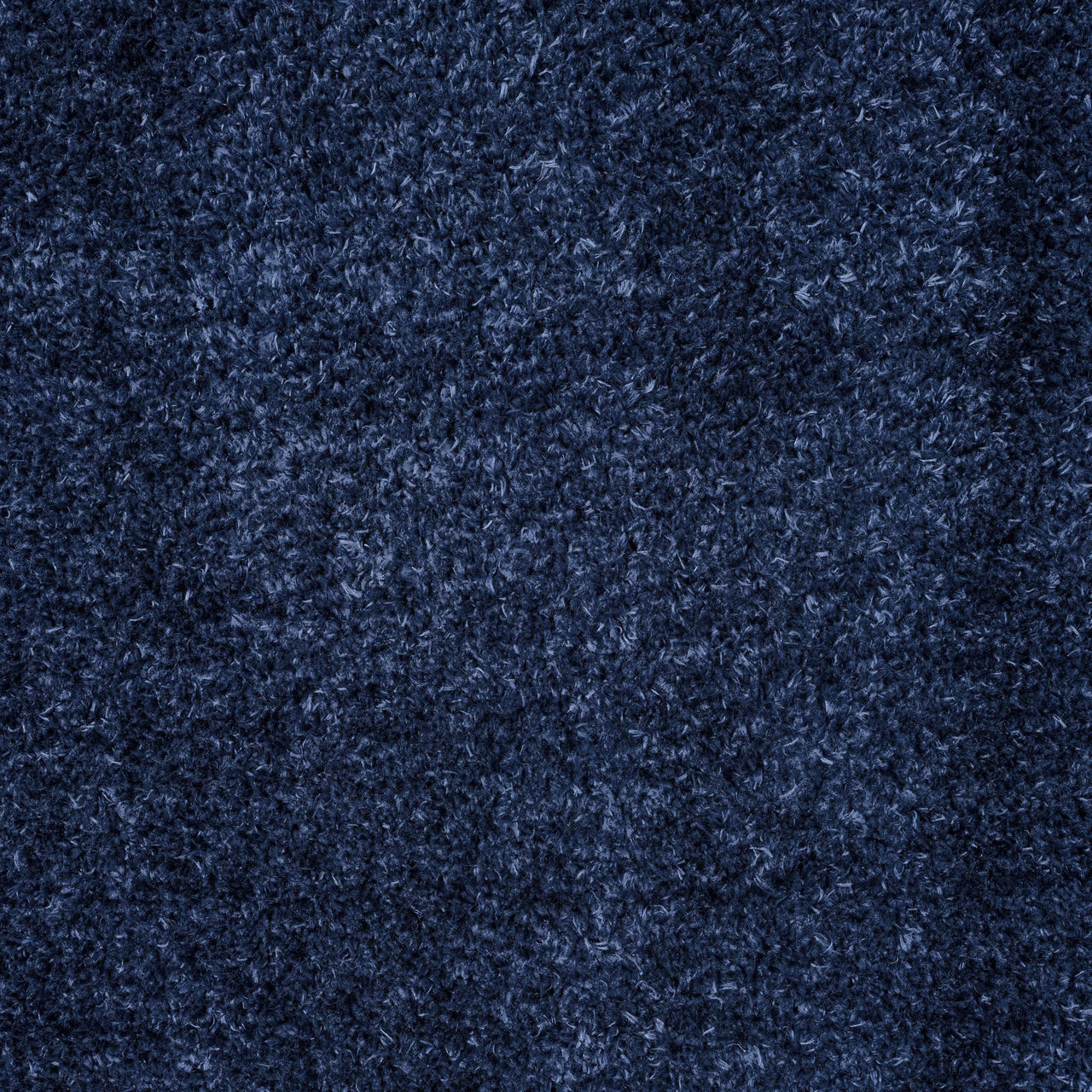 Navy blue modern shaggy runner rug with dense, textured polyester fibers.