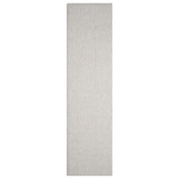 Beige flatweave runner rug with subtle textured pattern and minimalist modern design.