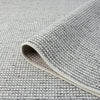 Grey flatweave runner rug with tightly woven textured loops and clean edges.