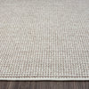 Beige flatweave runner rug with subtle geometric pattern and cream woven texture.