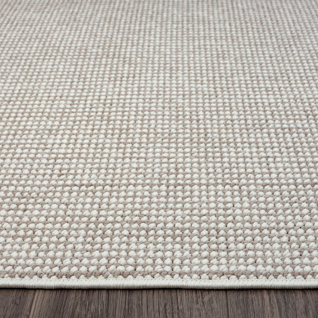 Beige flatweave runner rug with subtle geometric pattern and cream woven texture.