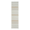 Beige and cream runner rug with modern geometric diamond and circle pattern and fringed edges.