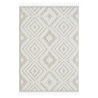 Beige and white rug with raised geometric diamond patterns and fringed edges.