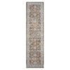 Runner rug with intricate brown and beige floral medallion pattern on a light blue-gray background.
